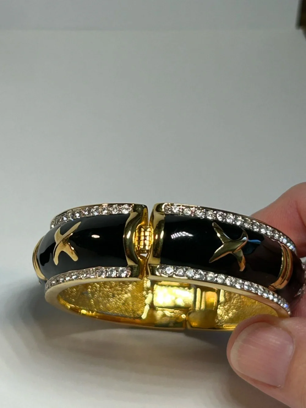 Gold-Tone Black Enamel X Accent Bangle Bracelet